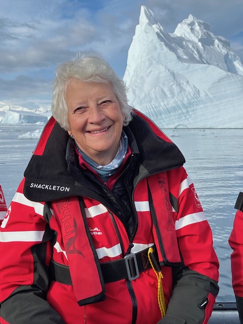 Photograph of Philippa Foster Back in front of an iceberg