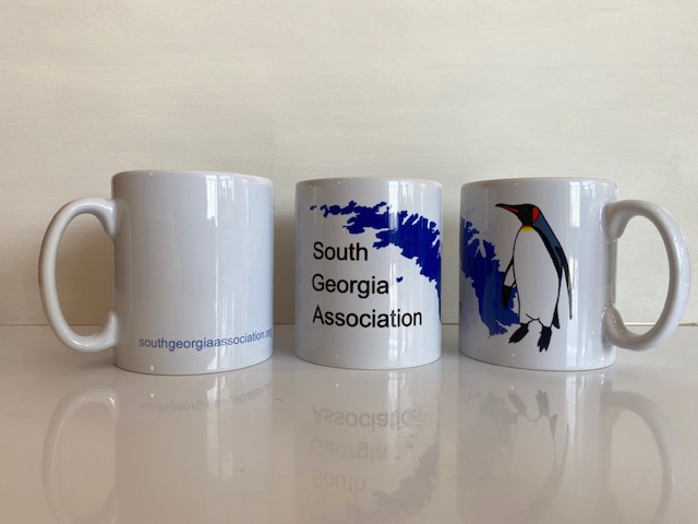 three mugs with SGA logo